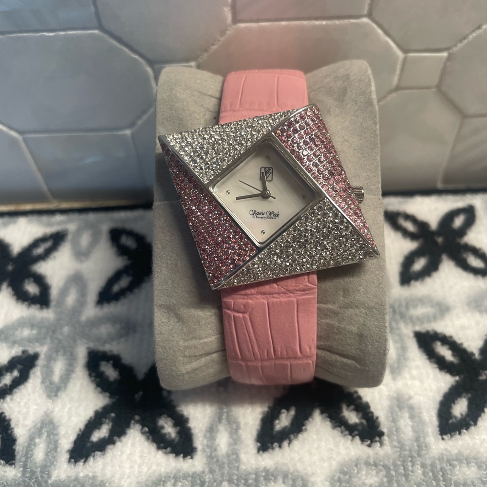 Victoria Weick Beverly hills watch
genuine leather.